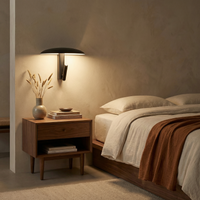 Applique murale rotative en métal noir – Zolanire