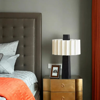 Scandinavian minimalist black table lamp Norélys with pleated white lampshade – view 6