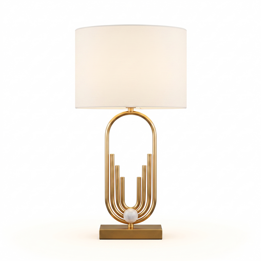 Table Lamp Raynova Gold Design with Architectural Base and Cylindrical Fabric Shade - View 1 - Lumière